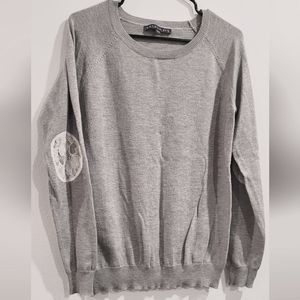 Gray sweater with lace elbow accent
